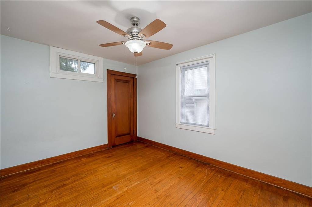117 Freeport Road Butler, PA 16002 - Photo 13 of 25 a view of a big room with wooden floor and windows