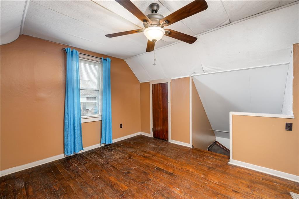 117 Freeport Road Butler, PA 16002 - Photo 15 of 25 a view of a livingroom with a ceiling fan and wooden floor