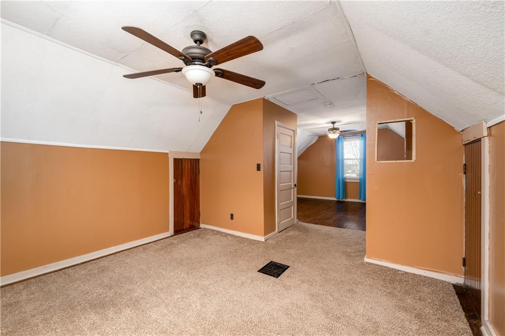 117 Freeport Road Butler, PA 16002 - Photo 19 of 25 a view of a livingroom with a ceiling fan and closet