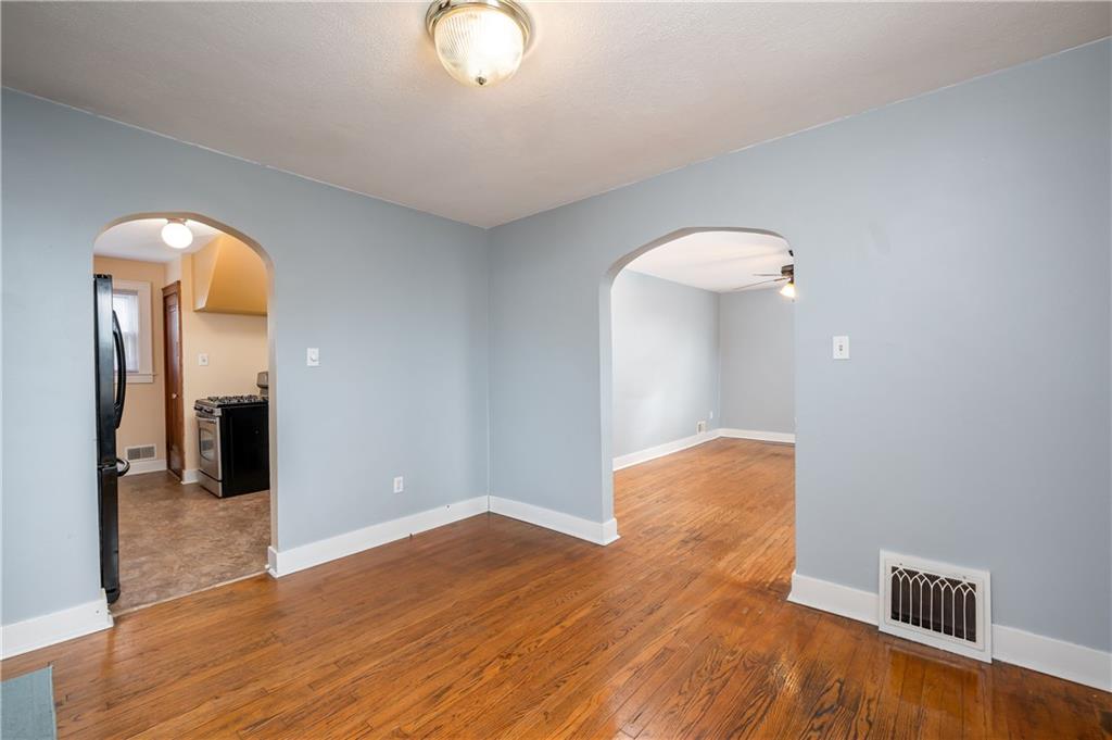 117 Freeport Road Butler, PA 16002 - Photo 8 of 25 a view of empty room with wooden floor