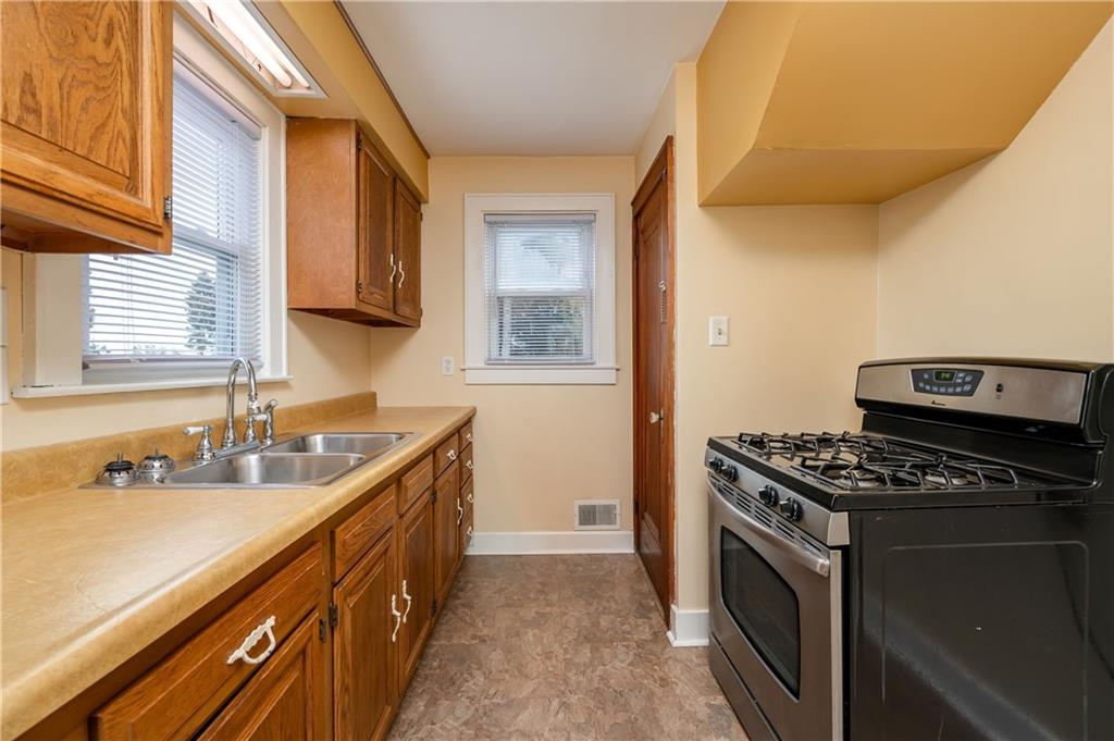117 Freeport Road Butler, PA 16002 - Photo 10 of 25 a kitchen that has a sink and a stove