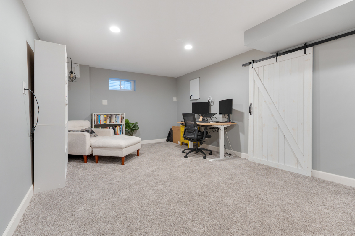 328 South 14th Street St. Charles, IL 60174 - Photo 14 of 20 a view of a workspace with furniture and a window