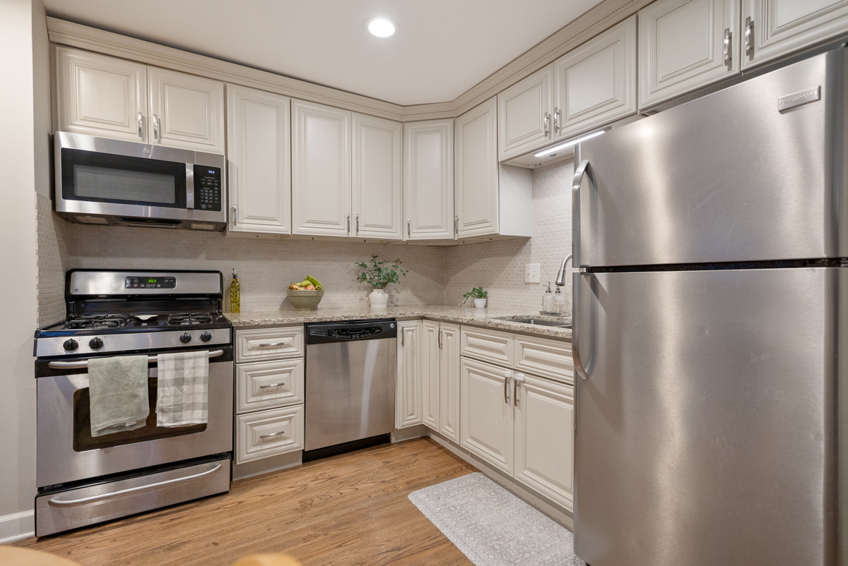 328 South 14th Street St. Charles, IL 60174 - Photo 6 of 20 a kitchen with stainless steel appliances a refrigerator stove and microwave
