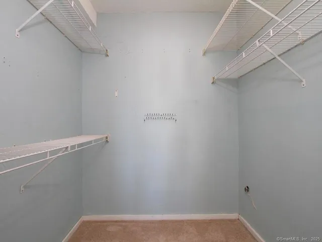 a view of a room with racks on the wall