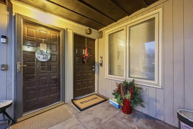 a view of door with glass door