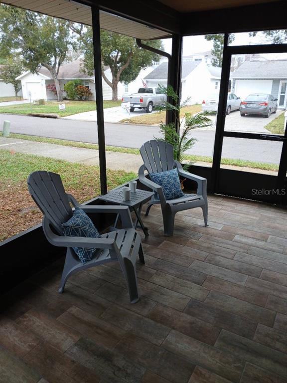 156 Devon Court Dunedin, FL 34698 - Photo 20 of 21 a view of swimming pool with outdoor seating