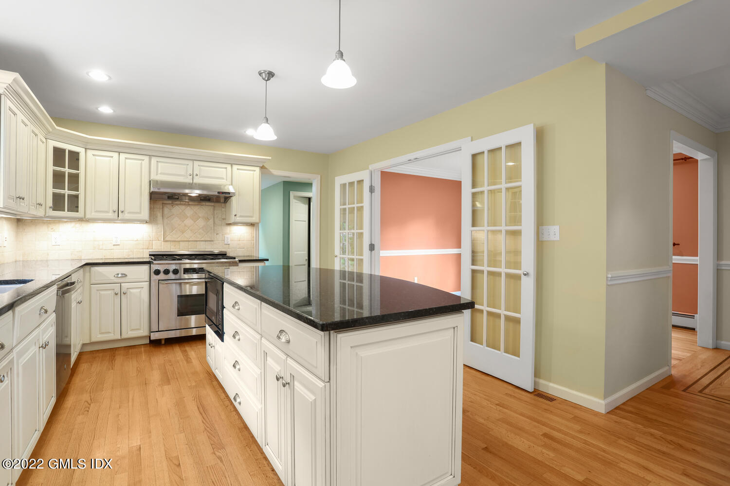 1 Sundance Drive Cos Cob, CT 06807 - Photo 11 of 50 a kitchen with stainless steel appliances granite countertop a stove and a sink