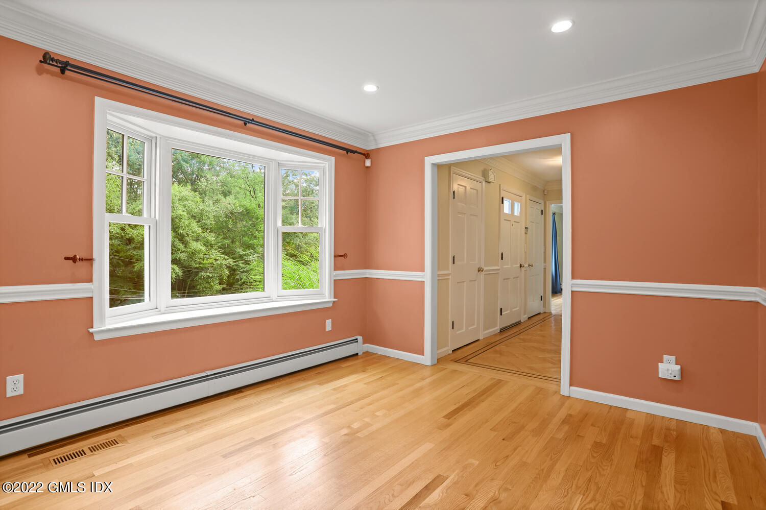 1 Sundance Drive Cos Cob, CT 06807 - Photo 19 of 50 an empty room with wooden floor and windows