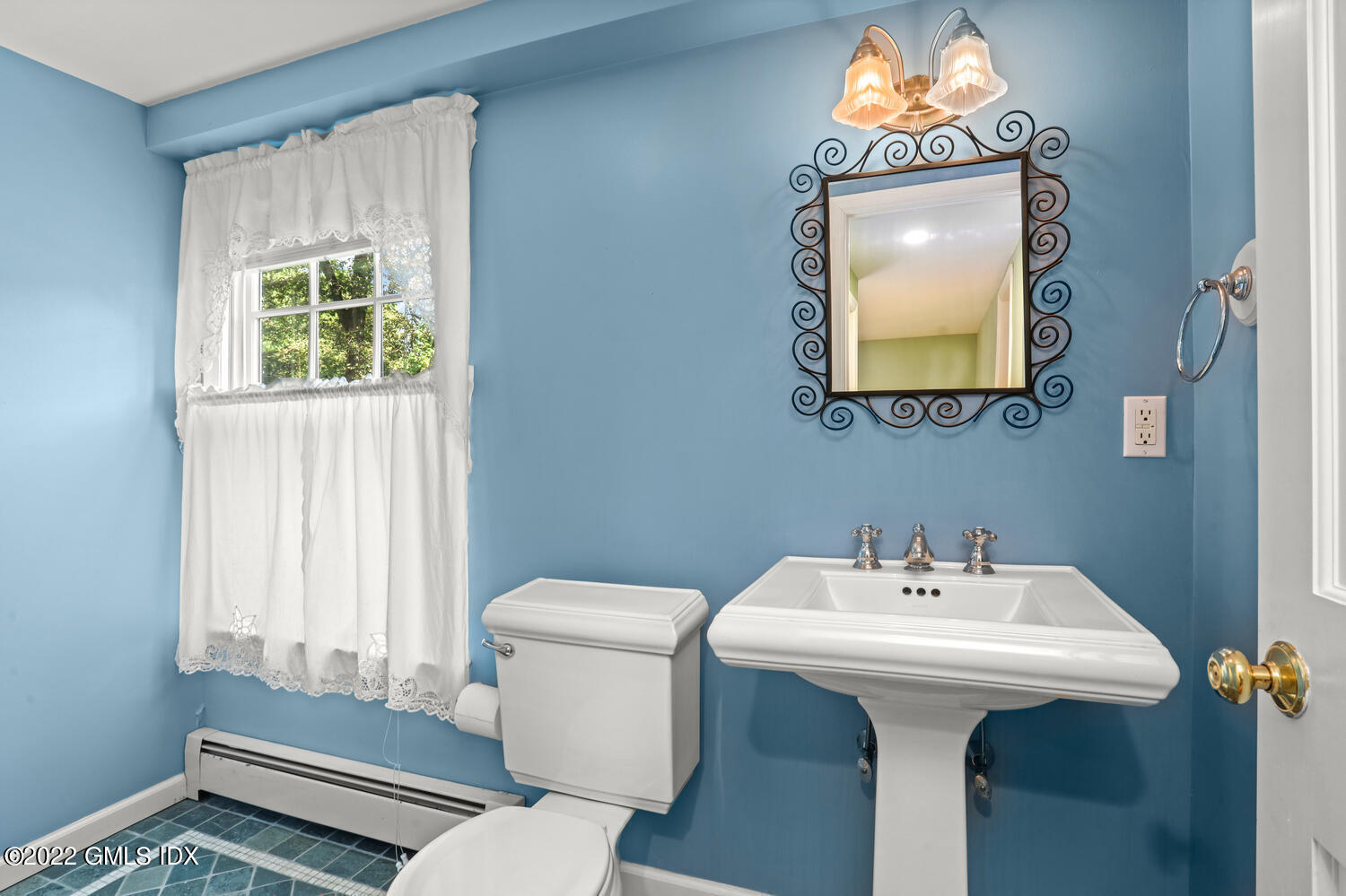 1 Sundance Drive Cos Cob, CT 06807 - Photo 21 of 50 a bathroom with a sink toilet and mirror