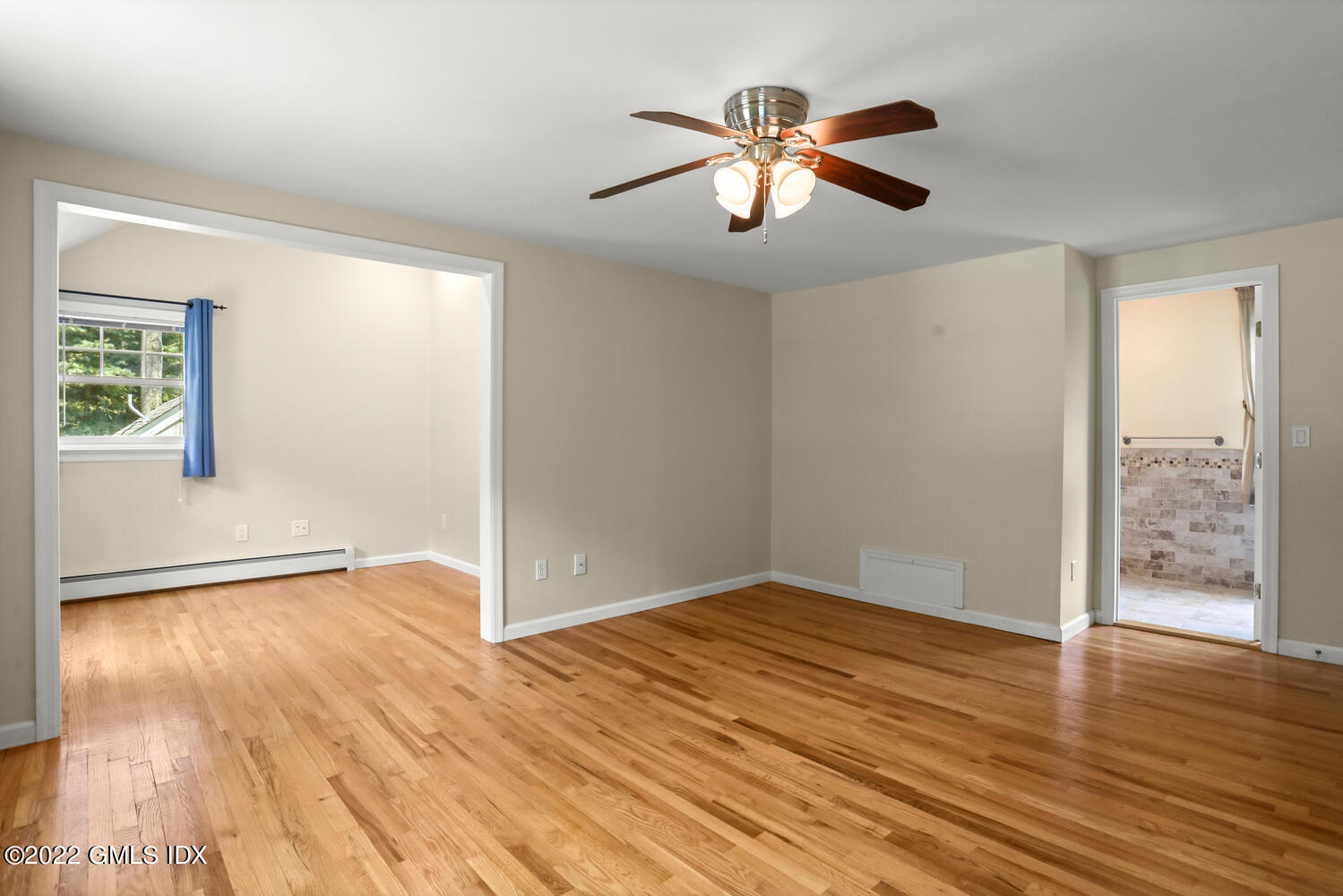 1 Sundance Drive Cos Cob, CT 06807 - Photo 23 of 50 wooden floor in an empty room with a window