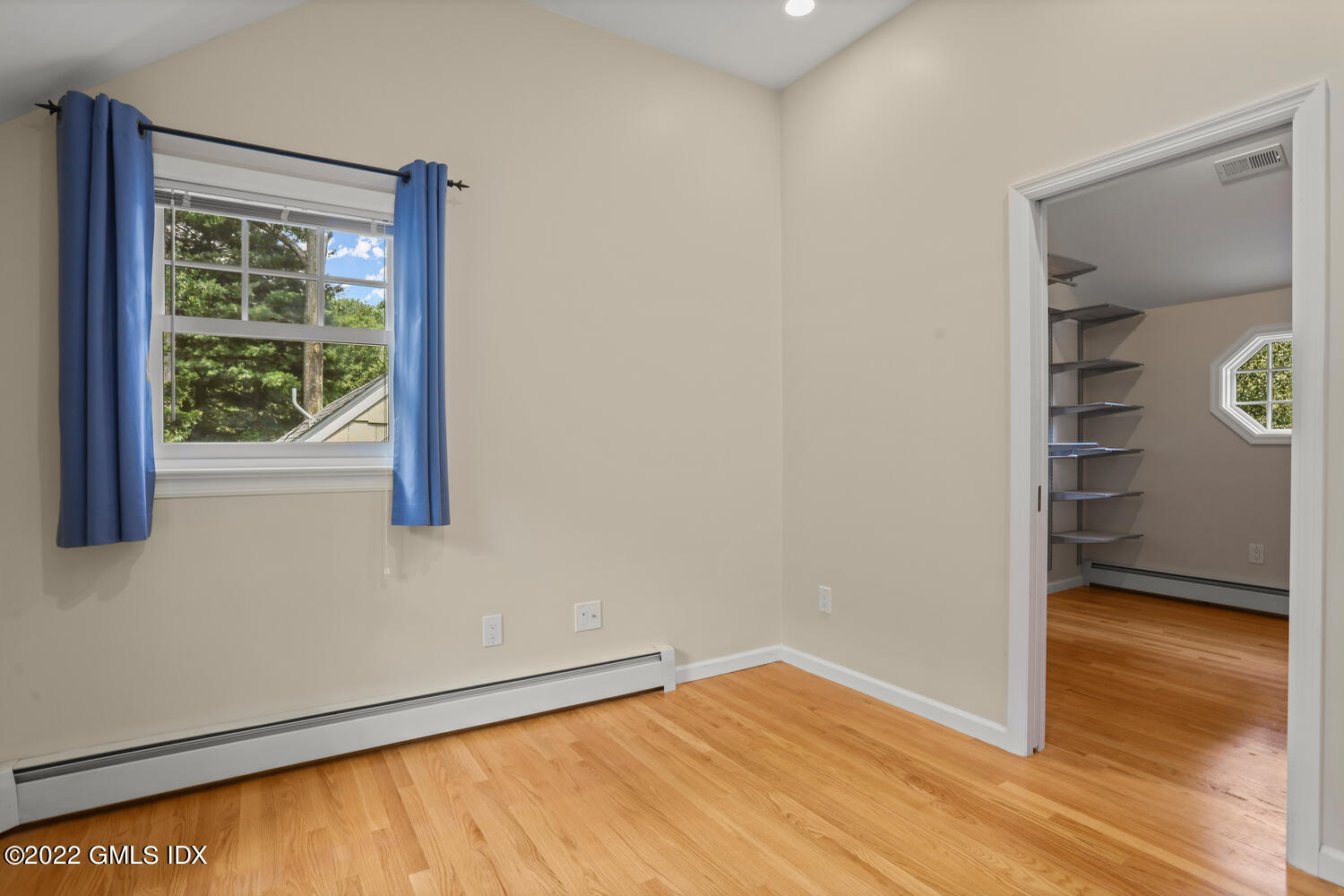 1 Sundance Drive Cos Cob, CT 06807 - Photo 25 of 50 a view of empty room with wooden floor and fan