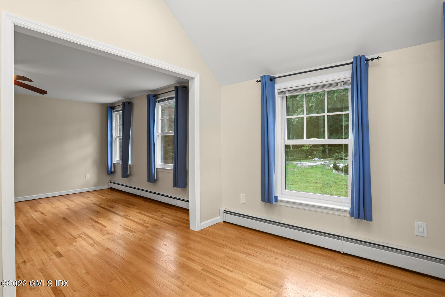 1 Sundance Drive Cos Cob, CT 06807 - Photo 27 of 50 an empty room with wooden floor and windows