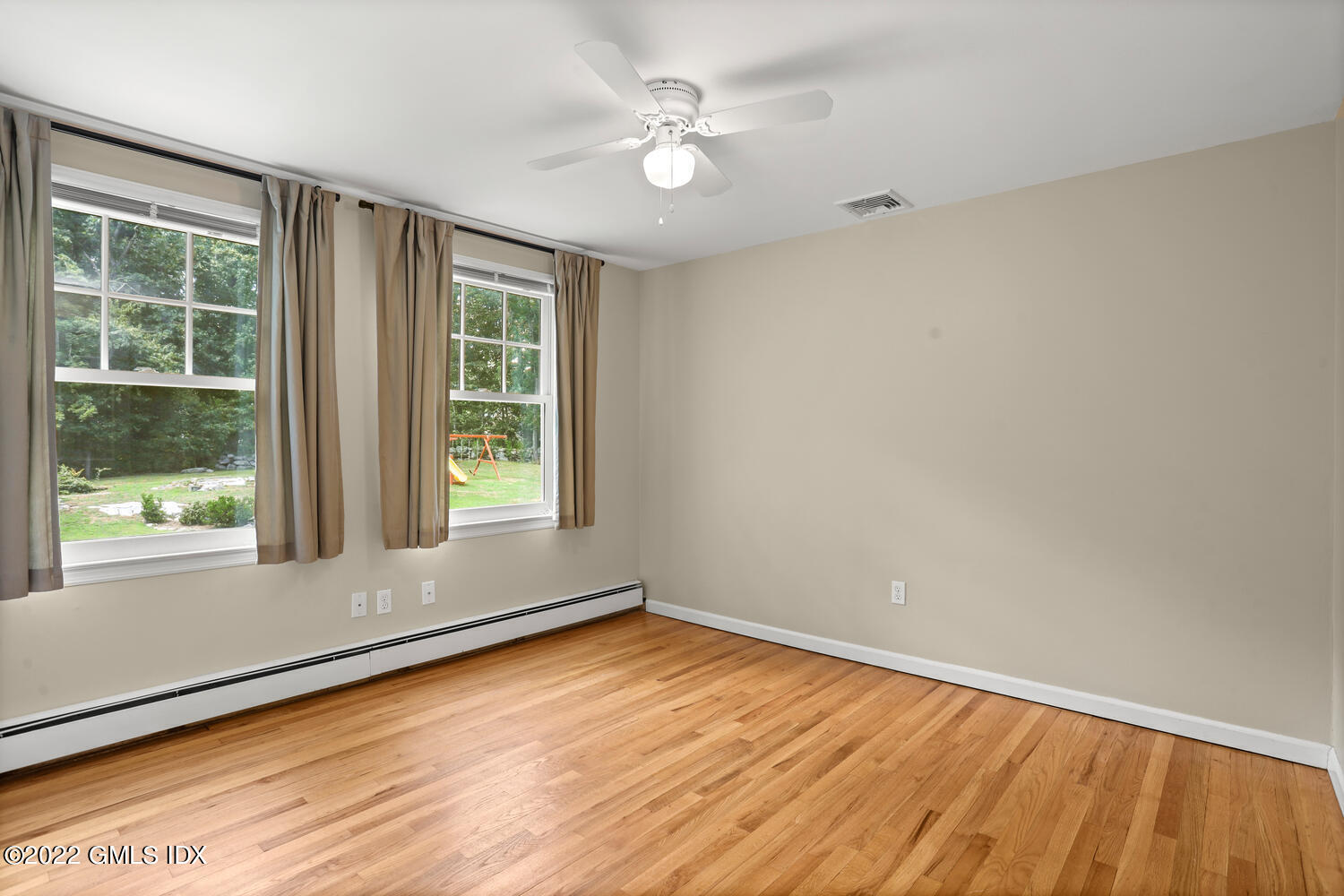 1 Sundance Drive Cos Cob, CT 06807 - Photo 35 of 50 wooden floor in an empty room with a window