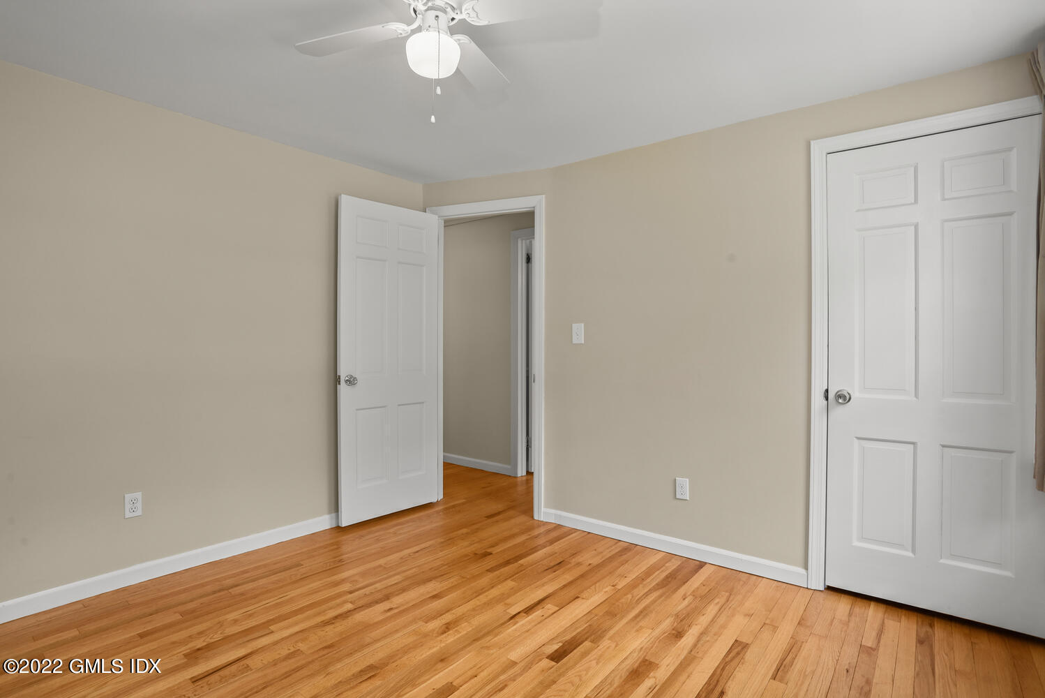 1 Sundance Drive Cos Cob, CT 06807 - Photo 36 of 50 a view of an empty room with wooden floor