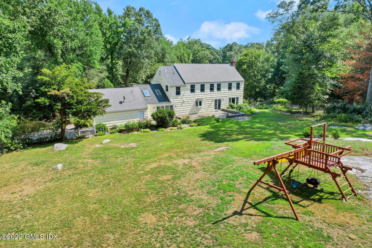 1 Sundance Drive Cos Cob, CT 06807 - Photo 45 of 50 a view of a house with a yard and sitting area