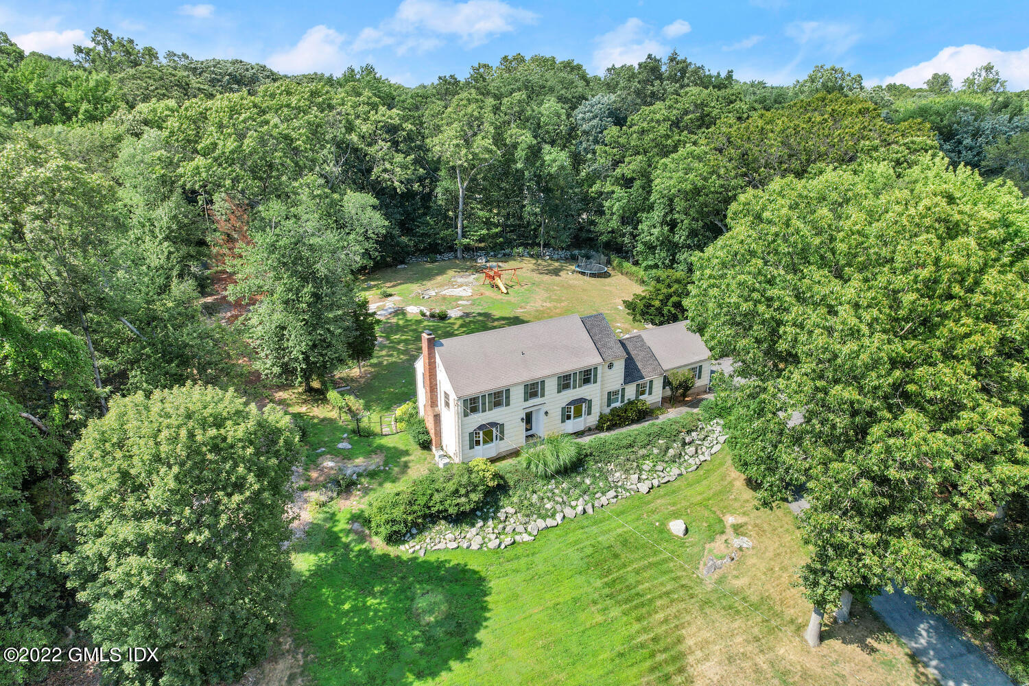 1 Sundance Drive Cos Cob, CT 06807 - Photo 48 of 50 an aerial view of a house with a yard