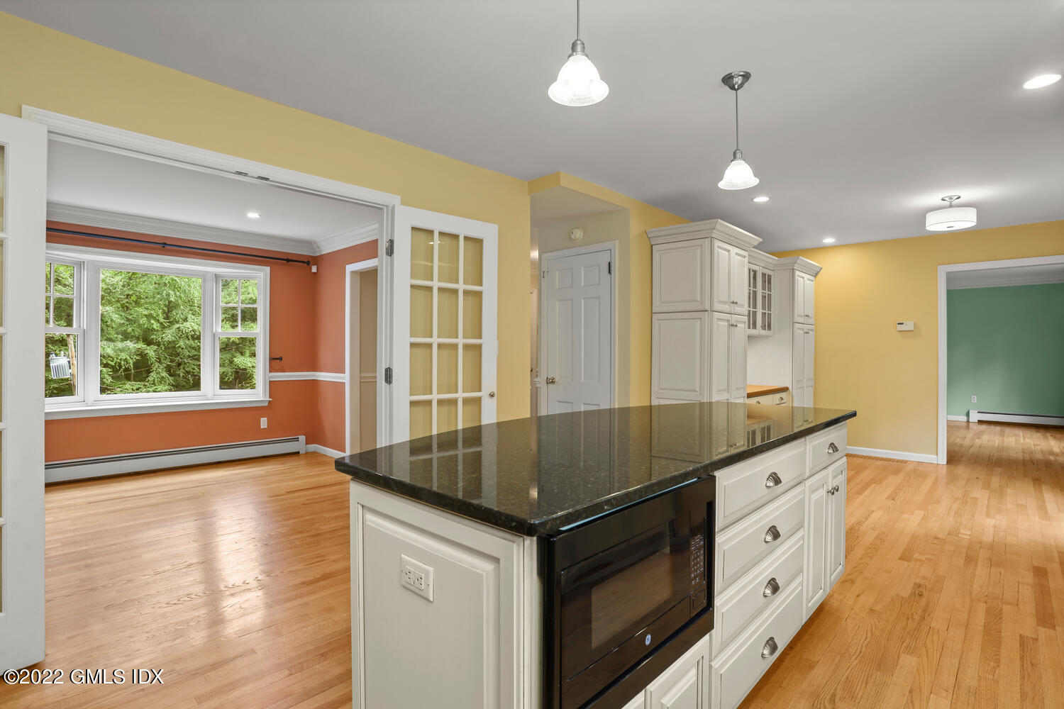 1 Sundance Drive Cos Cob, CT 06807 - Photo 7 of 50 a kitchen with granite countertop a stove and a sink