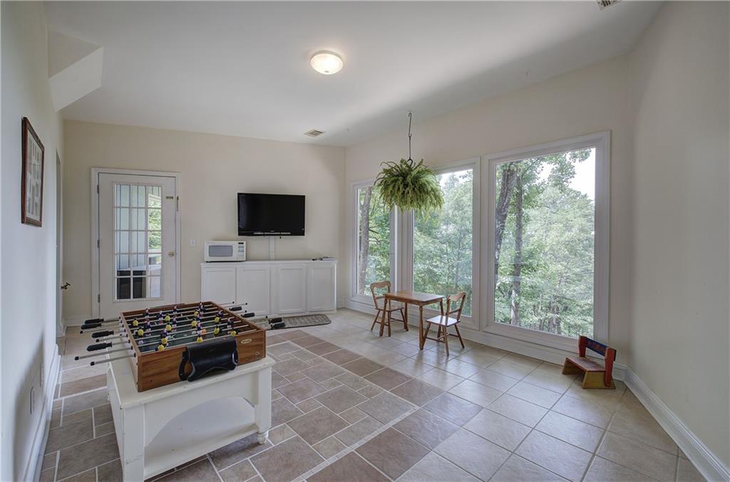 213 South View Trail Jasper, GA 30143 - Photo 46 of 79 a living room with furniture and a flat screen tv