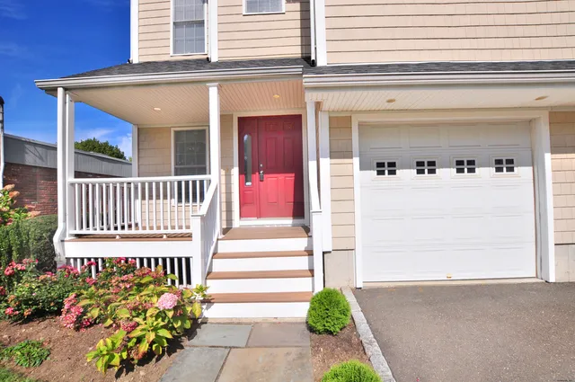 a view of a house with a porch