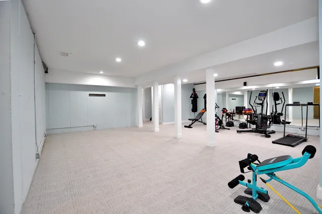 a view of a room with gym equipment