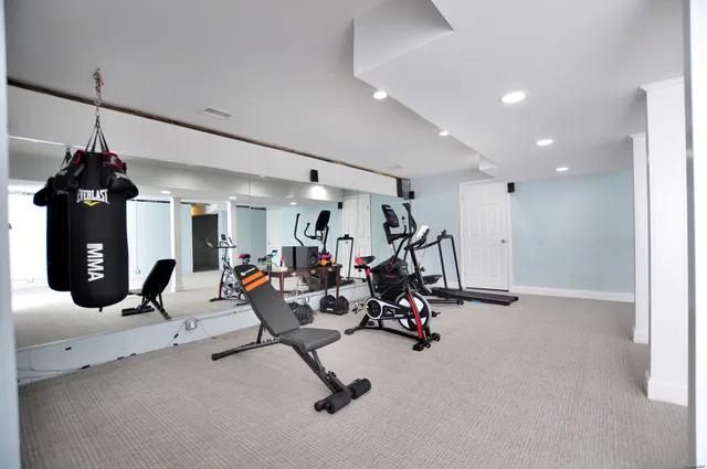 a view of a room with gym equipment