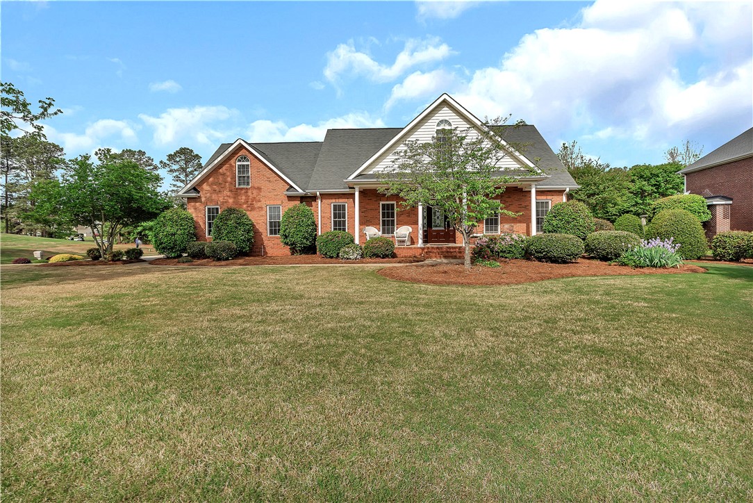 3108 Cobbs Way Anderson, SC 29621 - Photo 1 of 44 This classic brick residence features a welcoming porch, perfect for enjoying the manicured lawn.