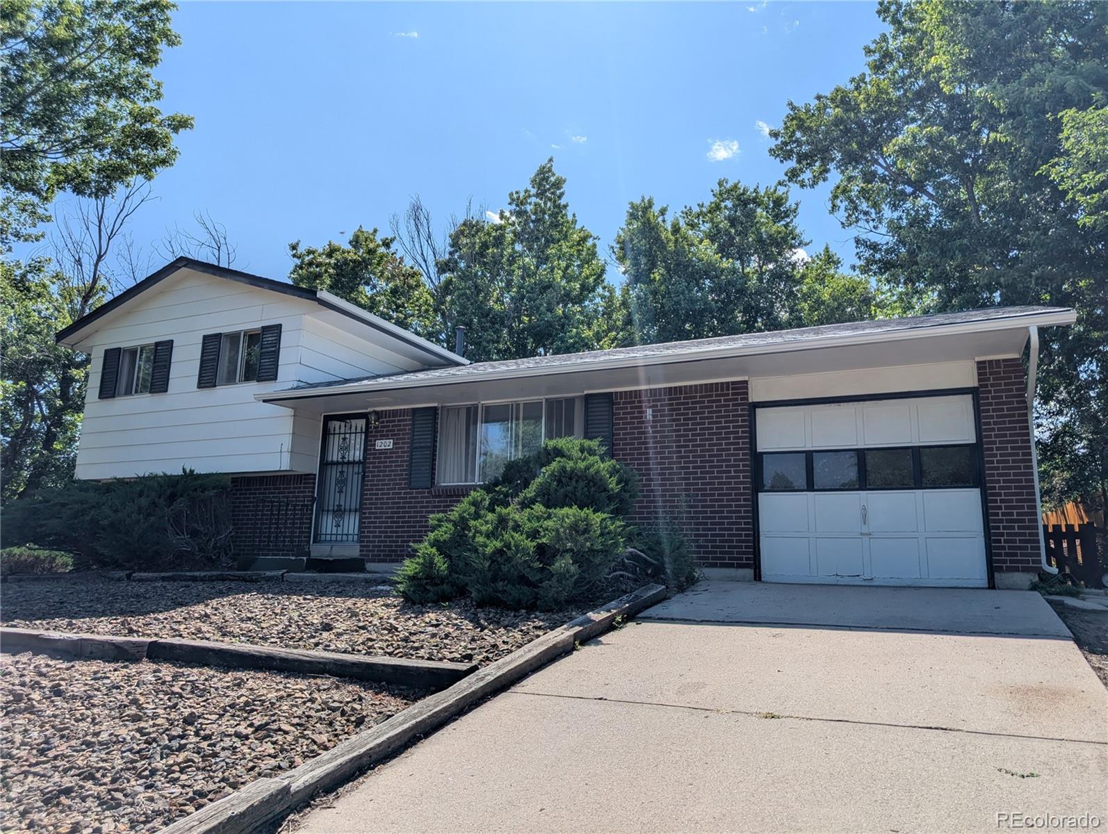 1202 Wooten Road Colorado Springs, CO 80915 - Photo 1 of 27 Gallery Image 1