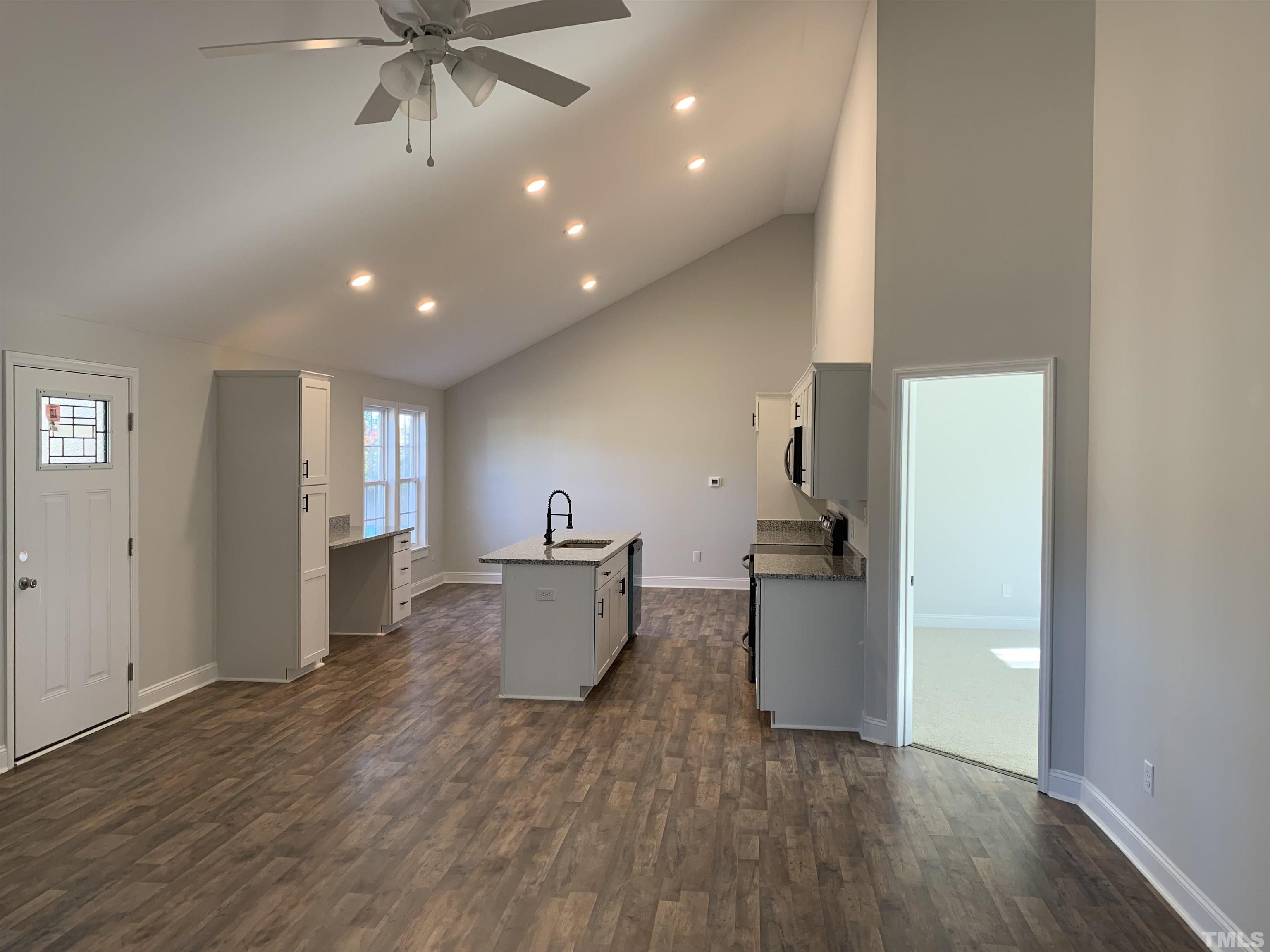 337 Chisenhall Road Angier, NC 27501 - Photo 1 of 7 a view of a kitchen with a sink and dishwasher