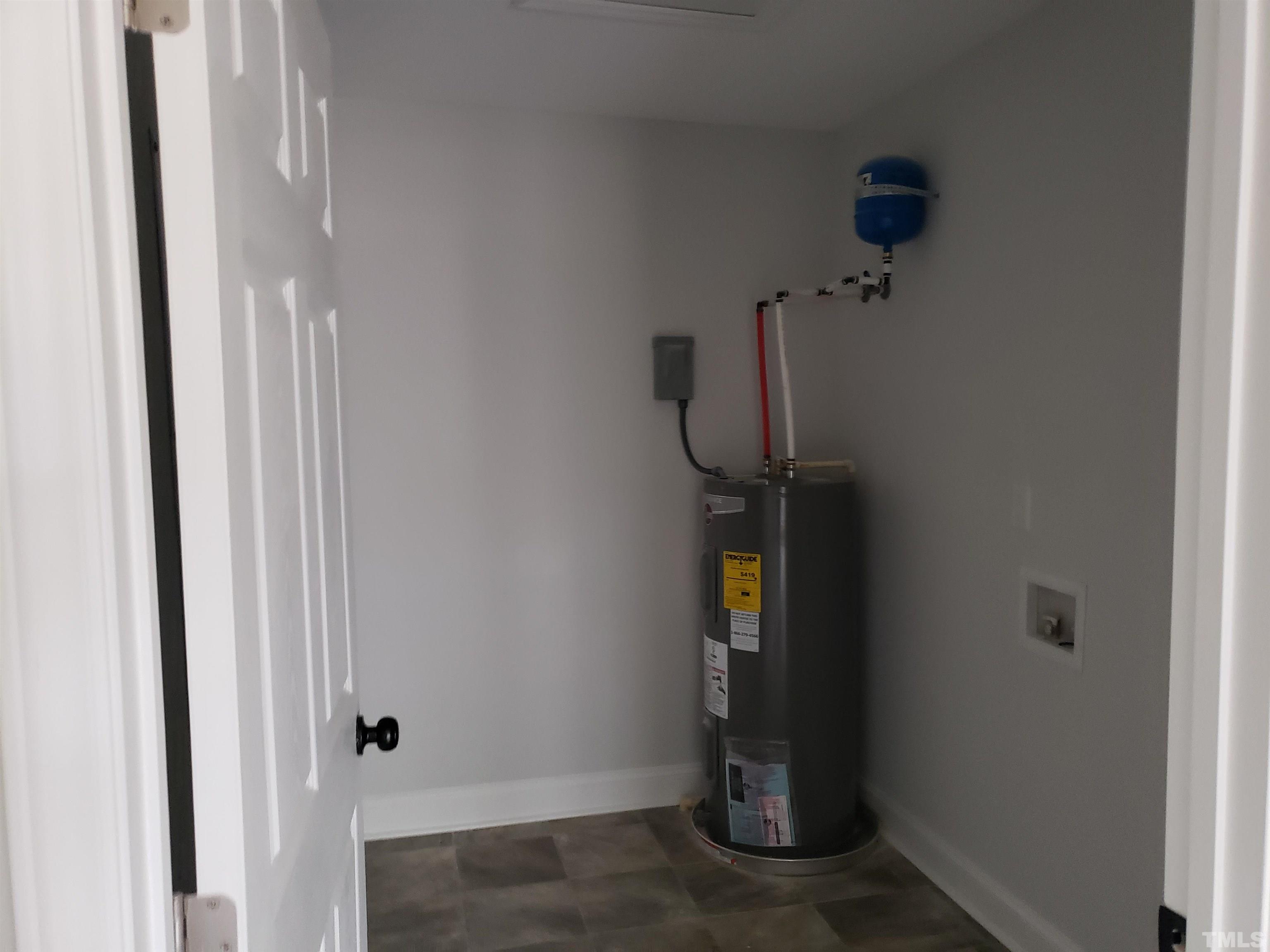 337 Chisenhall Road Angier, NC 27501 - Photo 6 of 7 a view of water heater room