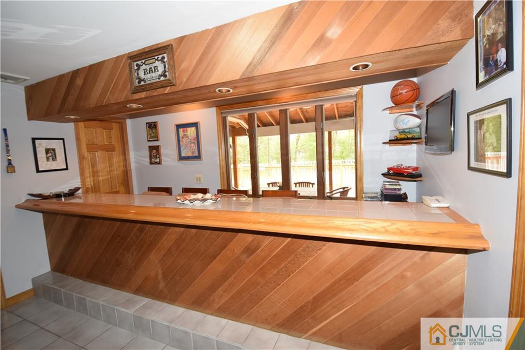 65 Warrenville Road Middlesex, NJ 08846 - Photo 16 of 22 a view of a living room and kitchen