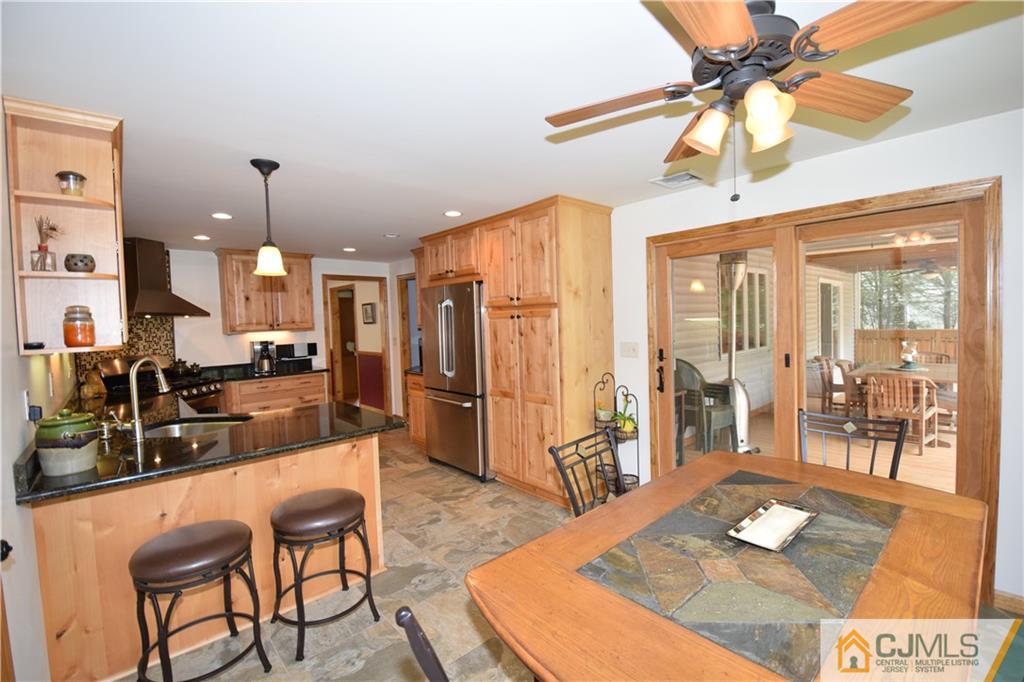 65 Warrenville Road Middlesex, NJ 08846 - Photo 9 of 22 a lobby with furniture and a chandelier