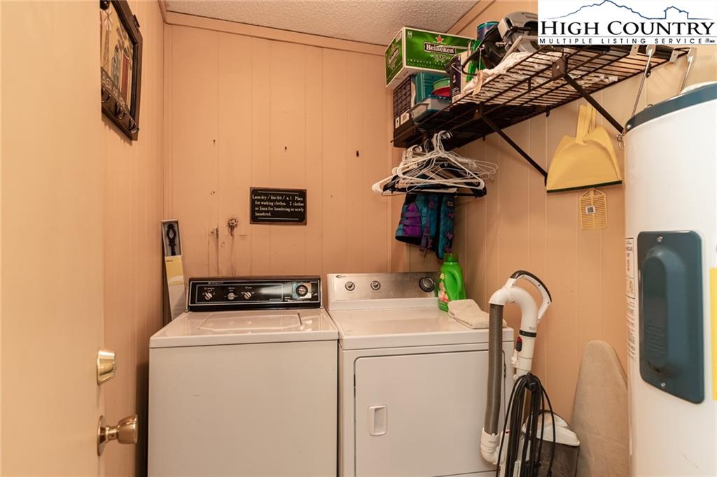 301 Pinnacle Inn Road, Unit 2316 Beech Mountain, NC 28604 - Photo 33 of 50 a utility room with dryer and washer