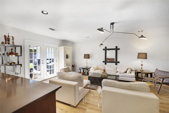 a living room with furniture and a table