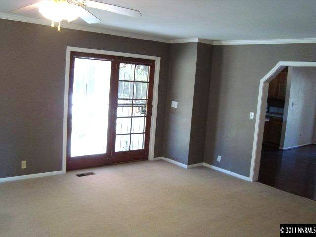 303 Rice Road Fallon, NV 89406 - Photo 3 of 13 an empty room with windows and closet