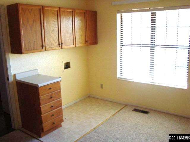 303 Rice Road Fallon, NV 89406 - Photo 10 of 13 a view of an empty room with a window