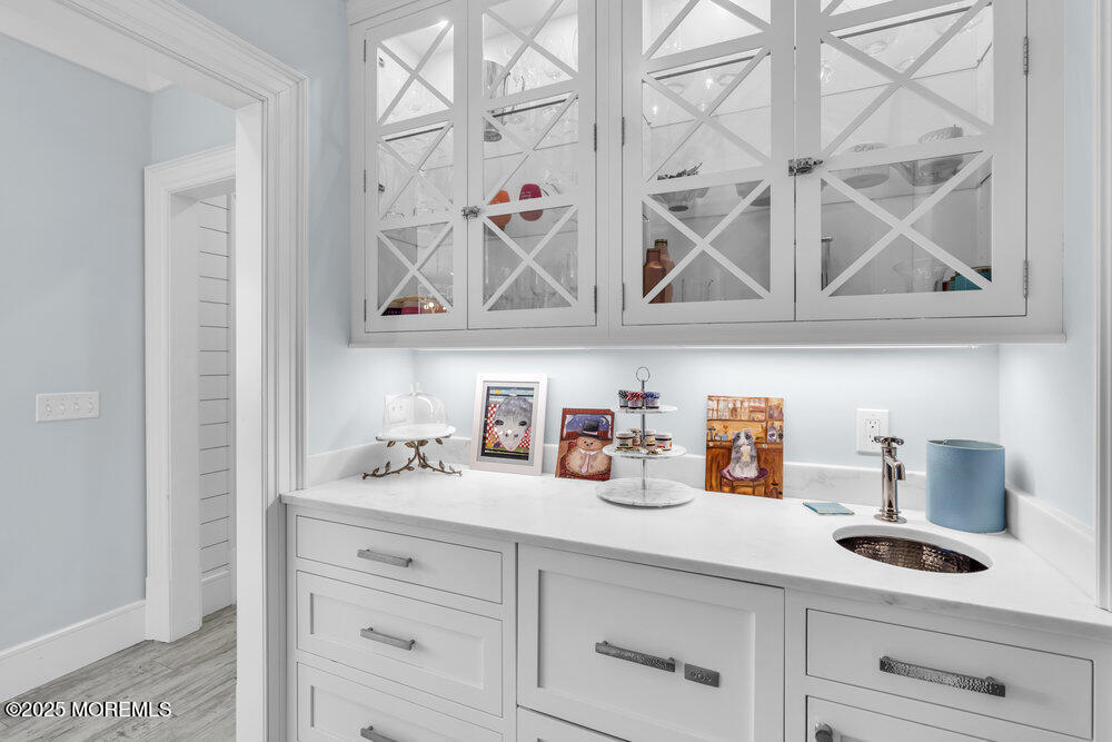 15 Madison Avenue Spring Lake, NJ 07762 - Photo 13 of 53 a kitchen with a sink and cabinets
