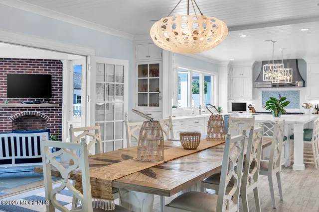 a view of a livingroom with furniture window and a fireplace