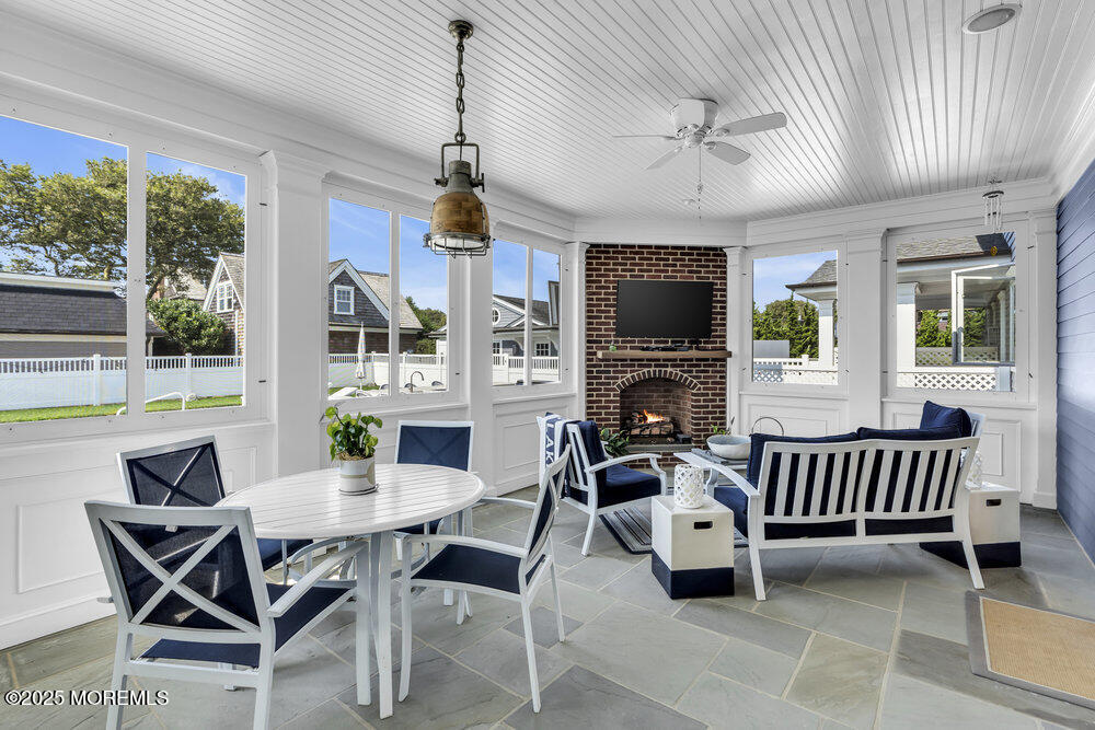 15 Madison Avenue Spring Lake, NJ 07762 - Photo 16 of 53 a view of a livingroom with furniture window and a fireplace