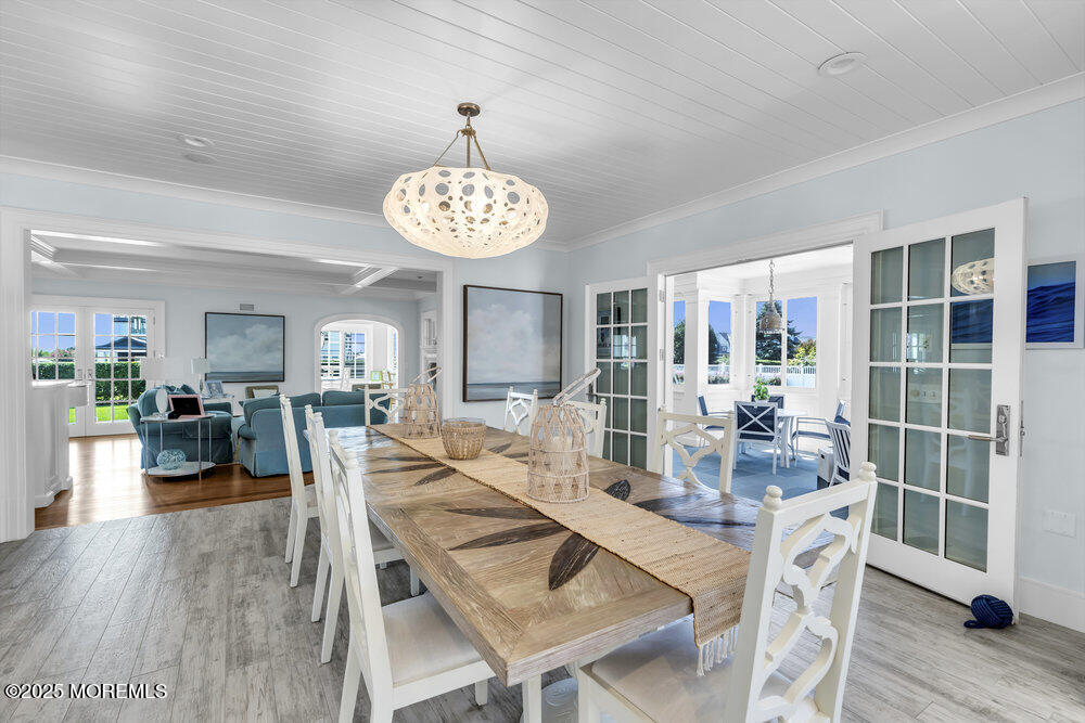 15 Madison Avenue Spring Lake, NJ 07762 - Photo 18 of 53 a view of a dining room with furniture wooden floor and chandelier