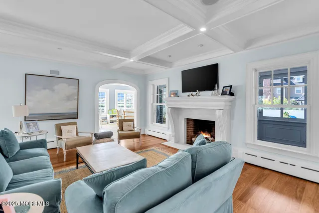 a work room with furniture and windows