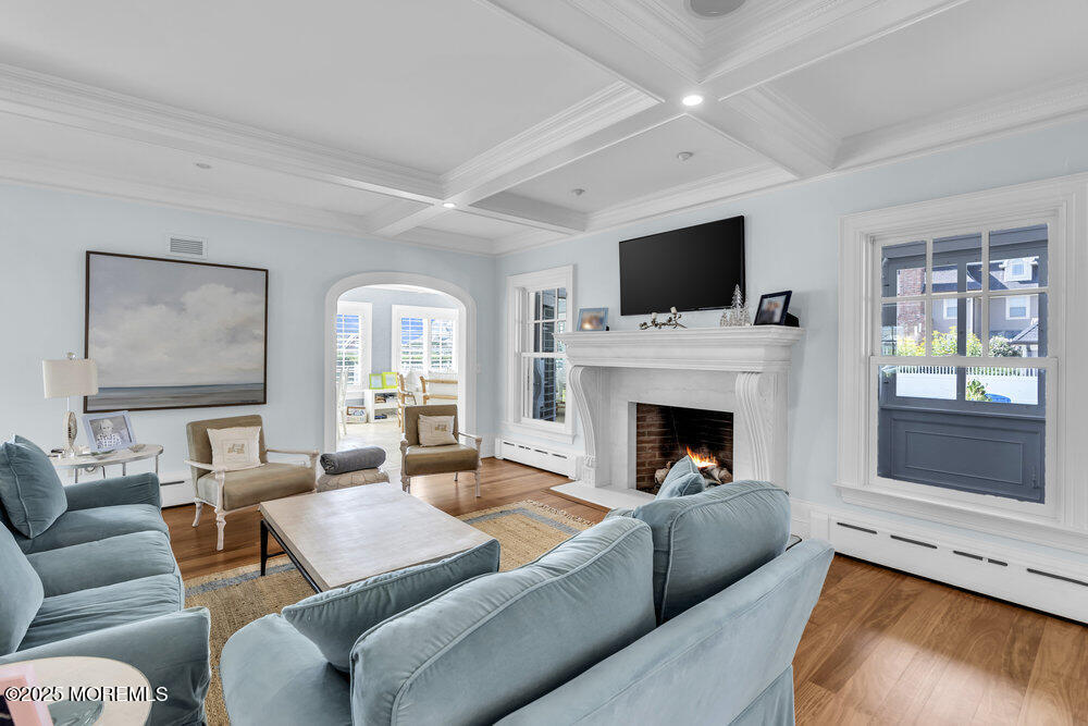 15 Madison Avenue Spring Lake, NJ 07762 - Photo 19 of 53 a living room with furniture fireplace and flat screen tv
