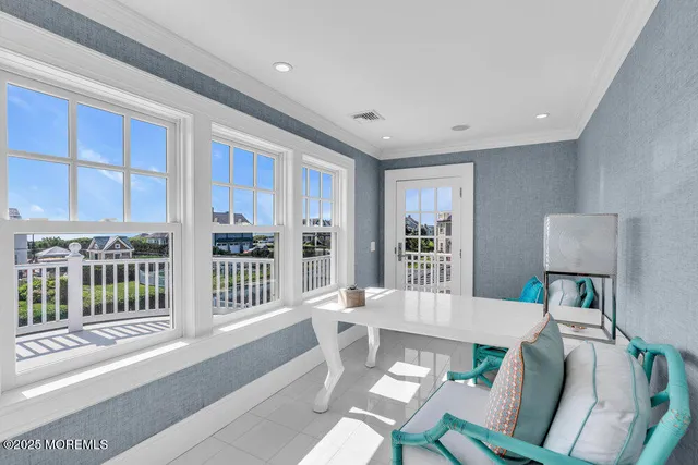 a spacious bathroom with a double vanity sink large mirror and a bathtub