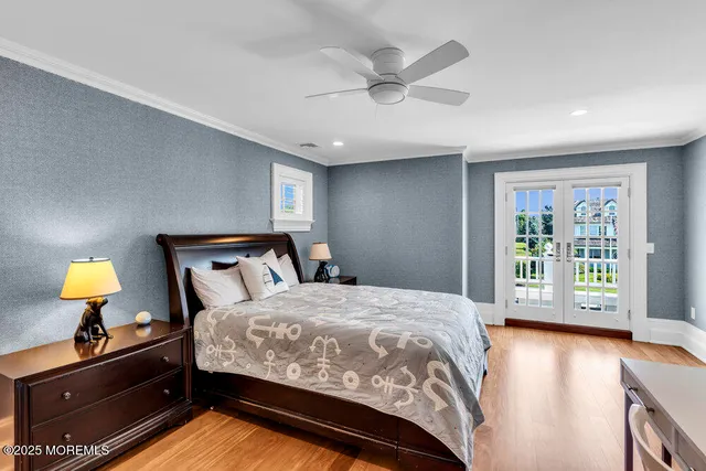 a spacious bedroom with a bed and a window