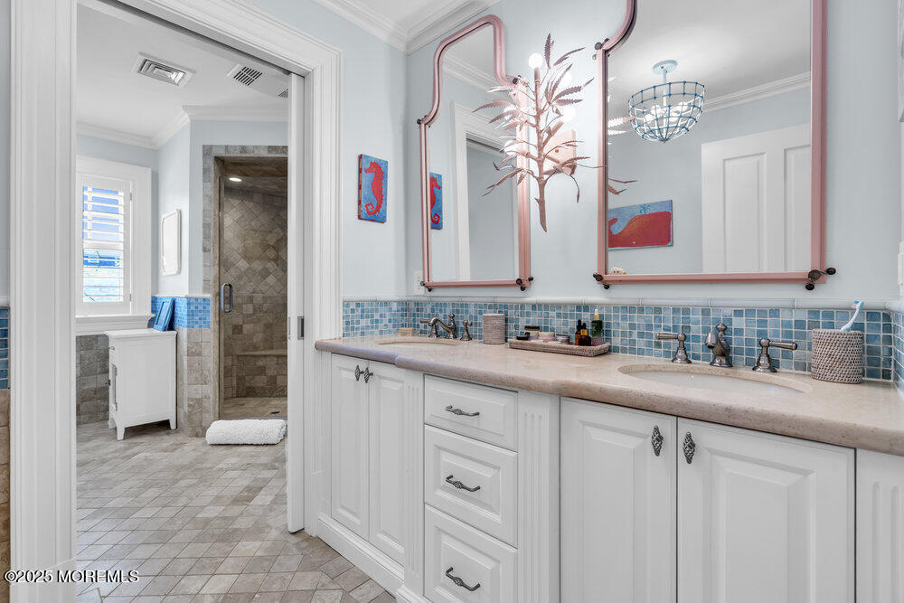 15 Madison Avenue Spring Lake, NJ 07762 - Photo 33 of 53 a bathroom with a sink and a mirror