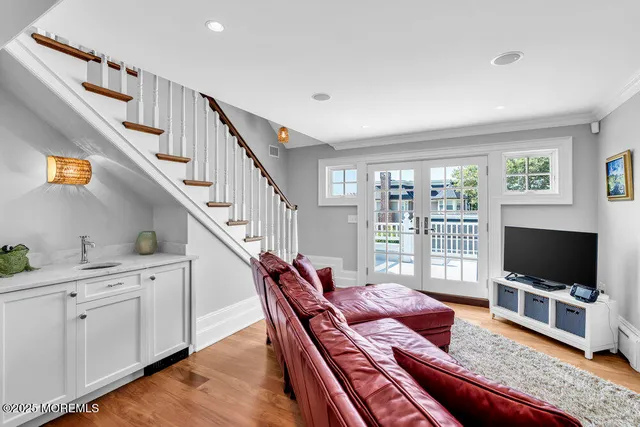 a living room with furniture and a table