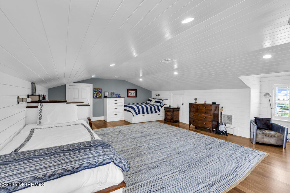 15 Madison Avenue Spring Lake, NJ 07762 - Photo 38 of 53 a living room with furniture and a table