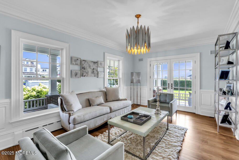 15 Madison Avenue Spring Lake, NJ 07762 - Photo 44 of 53 a living room with furniture and a wooden floor