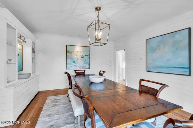 a living room with pool table