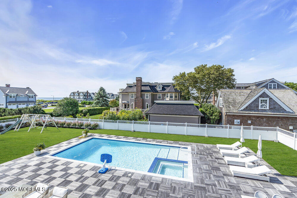 15 Madison Avenue Spring Lake, NJ 07762 - Photo 5 of 53 a view of swimming pool with a yard and a big yard
