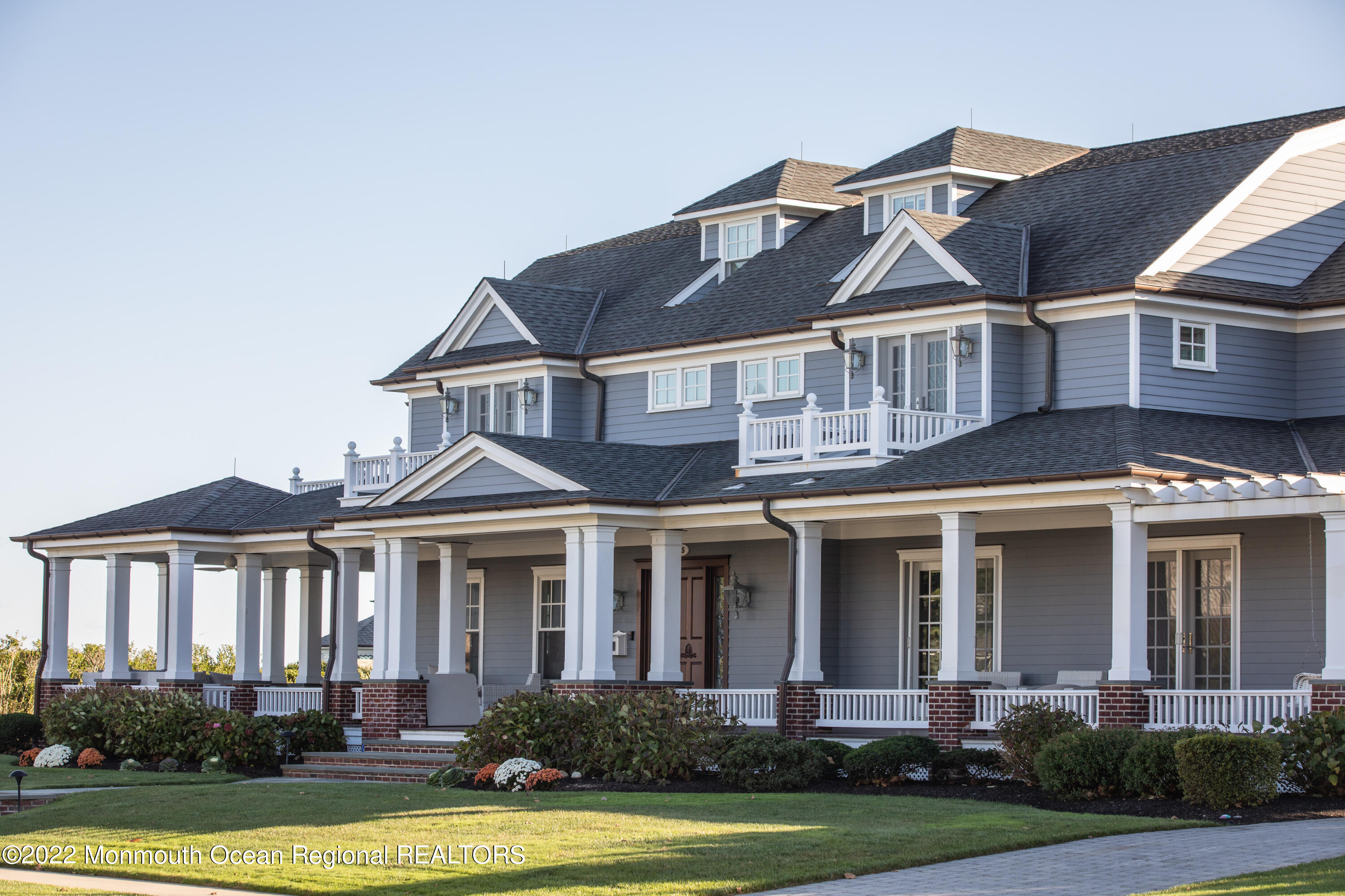 15 Madison Avenue Spring Lake, NJ 07762 - Photo 53 of 53 a front view of a house with a yard